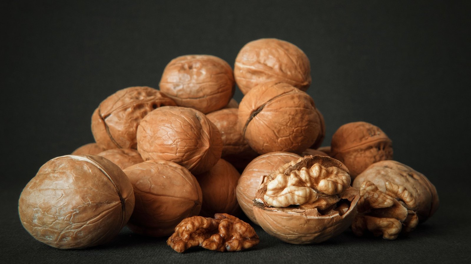 A spread of nutrient-dense whole foods — zinc, magnesium, vitamin D, and healthy fats provide the building blocks for testosterone production